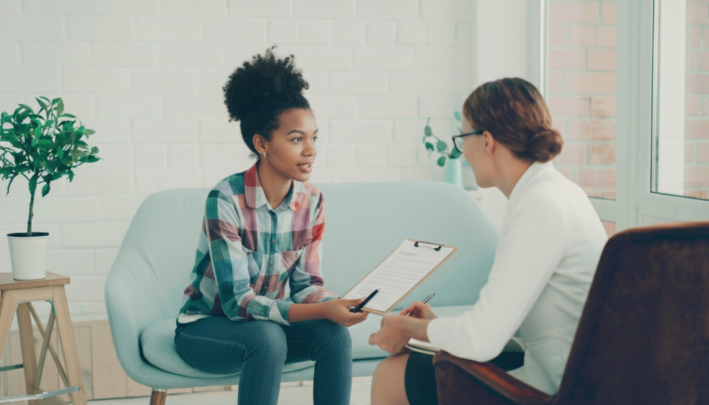 Young lady in consultation with specialist